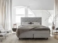 Letto con testiera Royal in tessuto imbottito e trapuntato di Duxiana